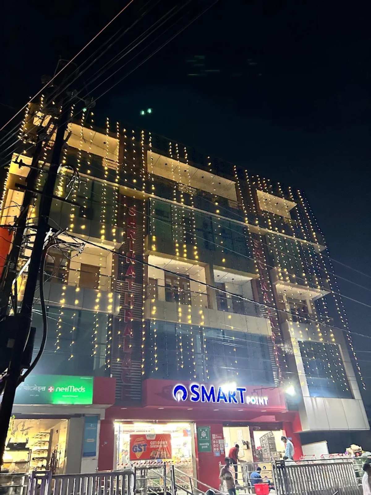 Shri Nath Palace Deoghar lit up with festive lights at night